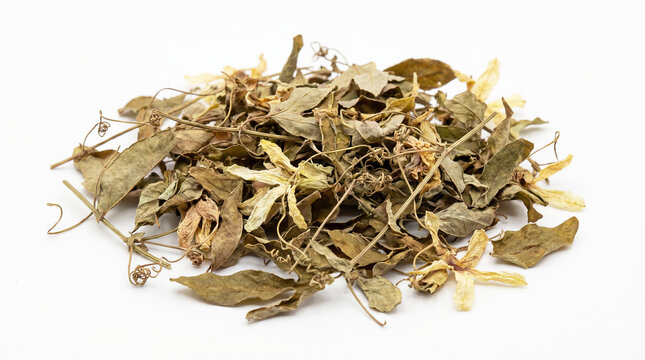 Small pile of dried passiflora leaves for preparing tea. Tradition and culture