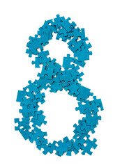 A collection of blue puzzle pieces is placed on a flat surface. The pieces are arranged in the shape of the number eight. This creates a visual representation emphasizing the number.