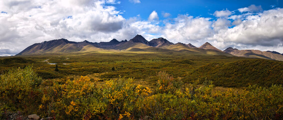 Sun shining on mountains on the Denali Highway