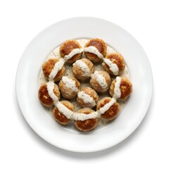 Golden meatballs with creamy sauce