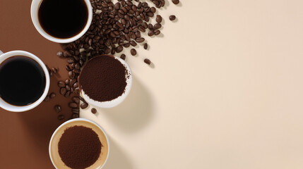 Flat lay of coffee cups, ground coffee, and roasted beans on a warm neutral background.
