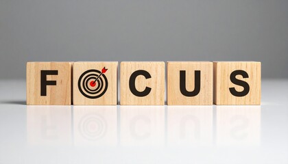 Focus" Spelled with Wooden Cubes on Grey &ndash; Symbolizing Business Goals, Academic Success, and New Year&rsquo;s Resolutions