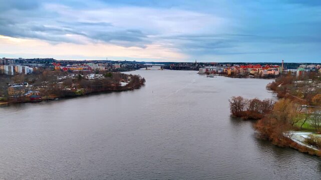 Peaceful waterscape of Lake Malar from drone footage. Western Bridge which connects S&ouml;dermalm to the island of Kungsholmen in Stockholm, Sweden at backdrop.