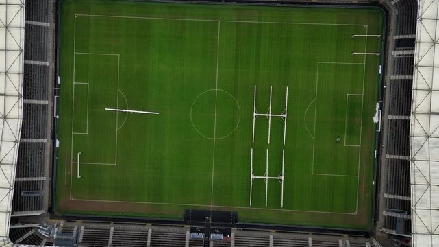 Top down aerial view of large football soccer stadium, green pitch in central Derby, United Kingdom.