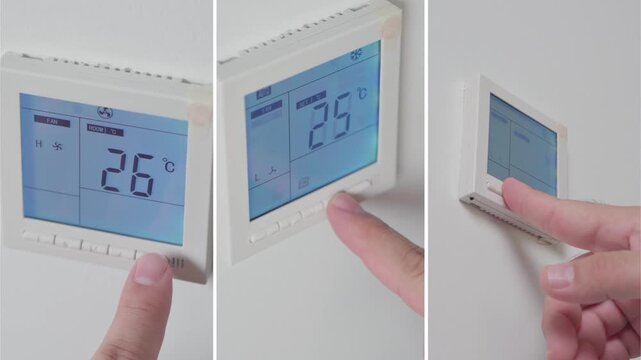 Adjust temperature at remote control with display for using air conditioner, close up. High quality 4k footage 