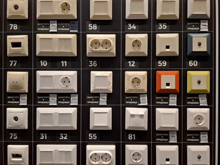 Many electric light switches in construction hypermarket