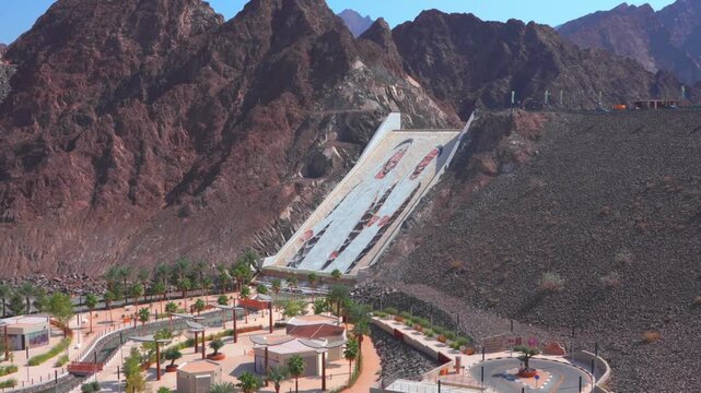 Hatta Dam Lake in mountains enclave region of Dubai, United Arab Emirates aerial footage. High quality 4k footage