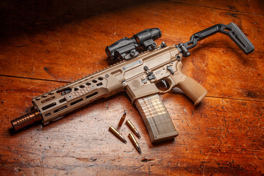 Sig Sauer MCX SPEAR LT SBR. .300 BLK caliber. Sig Romeo4XT Pro red dot sight and Sig Juliet 5 micro 5x magnifier. Lancer L5AWM GEN 2 magazine. Winchester Silvertip 150 grain ammunition.