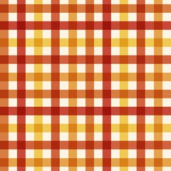 Seamless gingham pattern in warm autumn colors of red, orange, yellow, and cream