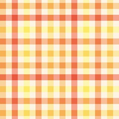 A seamless vector pattern of a classic gingham check in warm autumn colors including orange, yellow, and cream.