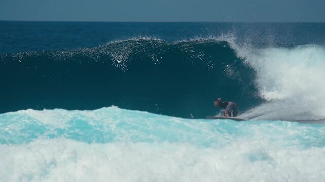 Surfer Dropping Into Heavy Reef Break Wave, Deep Bottom Turn And Explosive Whitewater, Dramatic Coastline, Raw