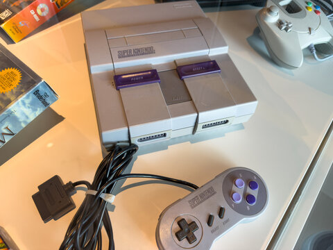 Super Nintendo Entertainment System Console And Controller Display