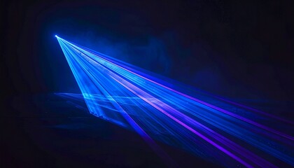 Laser light beams blue violet abstract illumination glowing streaks cutting darkness on black background creating dramatic low key atmosphere with sharp contrast energy motion technology nightlife sta