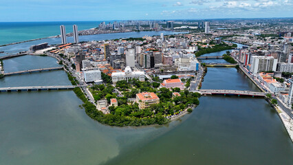 Northeastern Brazil Skyline In Recife Pernambuco Brazil. Bustling Downtown Cityscape With Modern Buildings. Town Sky Clouds Backgrounds Urban. Town Panorama. Recife Pernambuco. © bydronevideos