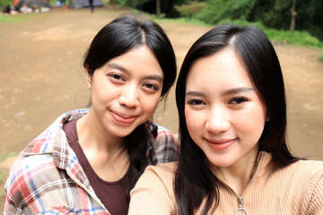 Two Young Asian Woman Selfie at an Outdoor Camping Ground