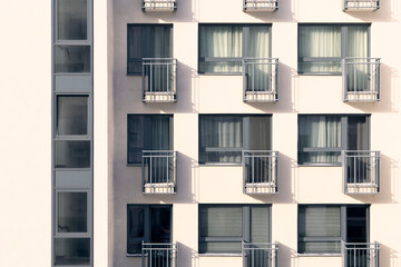 Abstract close-up of a modern residential building facade showin