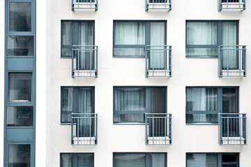 Abstract close-up of a modern residential building facade showin