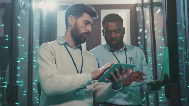 Engineer checks equipment, Technical staff collaboratively troubleshoot with focus and detailed inspection