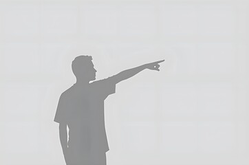 Silhouette of a Person Pointing Forward