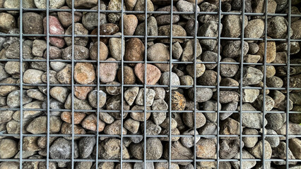 Side view of rocks wall with trellis or iron fence. background. copy space, empty, free, negative, text, design. close up. decor, decoration, decorative. interior, indoor. exterior