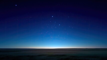 Fototapeta premium Serene Night Sky Over Wide Open Grassland Under Starry Heaven at Dusk with Gentle Blue and Black Gradient Horizon