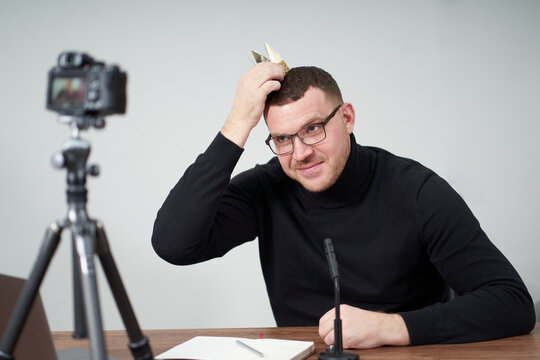 man filming video blog on camera with tripod for online followers. In social media, Influencer, new technology and internet concept - Powered by Adobe