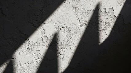 Abstract textured concrete wall surface illuminated by dramatic diagonal sunlight casting deep geometric shadows creating a minimalist and moody monochrome with background