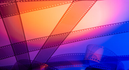 Abstract colorful cinematic background with film strip and free space for text