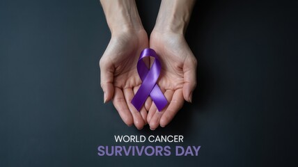 Fototapeta premium World cancer survivors day purple ribbon held in hands