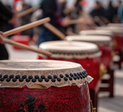 Close-up of large drums being played