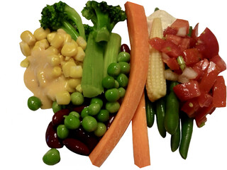 Mixed salad, Carrots, peas, broccoli, tomatoes, baby corn, green beans. and dressing isolated