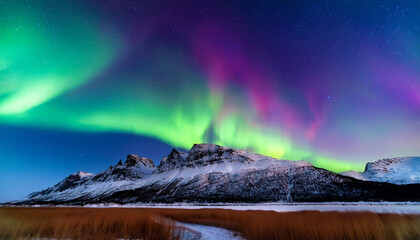 The Stunning Aurora Borealis Fills The Night Sky With Vivid Green And Violet Hues Captivating The Viewer As It Dances Over Mountains In This Breathtaking Natural Display