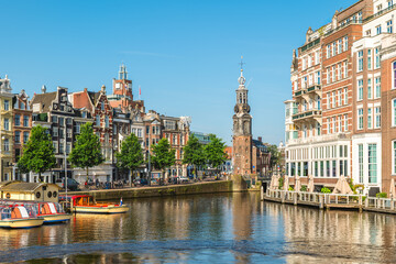 Obraz premium The Munttoren, the Mint Tower located on Muntplein square in Amsterdam, Netherlands