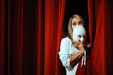 Actress Hiding Behind Curtains and Theatrical Mask. Stressed performer acting emotional and fearful
