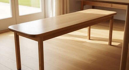 Minimalist light wood dining bench with clean lines in a bright interior