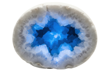 White geode stone cut open revealing glowing blue crystals on a transparent background
