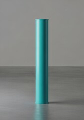 Isolated cylindrical object in turquoise, centered on a neutral surface