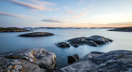 Serene Coastal Landscape at Dusk with Rocky Islands and Calm Water Keywords: coastal, landscape, dusk, sunset, twilight, ocean, sea, water, calm