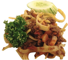 isolated Fettuccine pasta topped with tomato-based meat sauce, garnished with parsley and cucumber&mdash;hearty dish served warm with rustic texture and savory appeal.