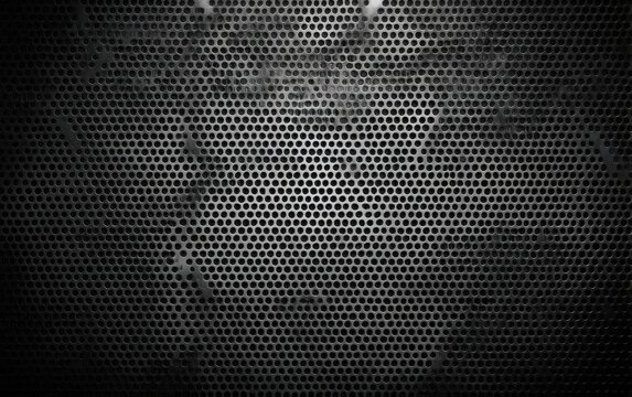 Dark metallic grid with a spotlight effect and subtle textured highlights - Powered by Adobe