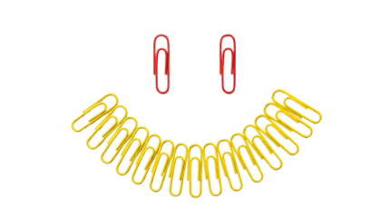 Two pink hoop earrings and a yellow coiled cord arranged to resemble a smiley face image clean white background cutout