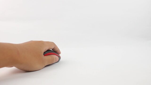hand holding computer mouse sliding in desired direction isolated on white background