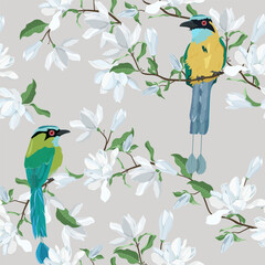 Blooming magnolias and birds of paradise against a gray backdrop. A seamless vector illustration suitable for decorating textiles, packaging, and wallpaper.
