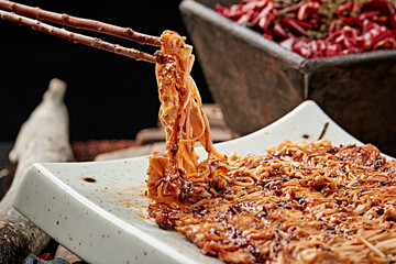 Charcoal-grilled enoki mushrooms with sauce