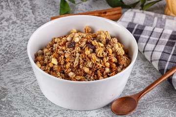 Fototapeta premium Dry Muesli granola snack with cereal, nuts and berries