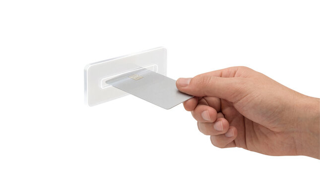 Male hand inserting blank silver credit card into payment slot or ATM reader isolated on transparent background