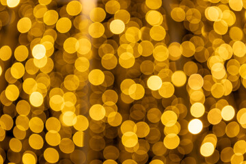 Warm glowing dots of golden bokeh produce a magical, celebratory mood, suitable for event posters, greeting headers, social media graphics and elegant festive branding.