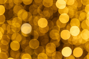 Warm glowing dots of golden bokeh produce a magical, celebratory mood, suitable for event posters, greeting headers, social media graphics and elegant festive branding.