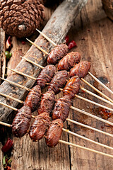 Charcoal-grilled silkworm pupae