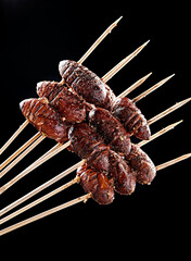 Charcoal-grilled silkworm pupae